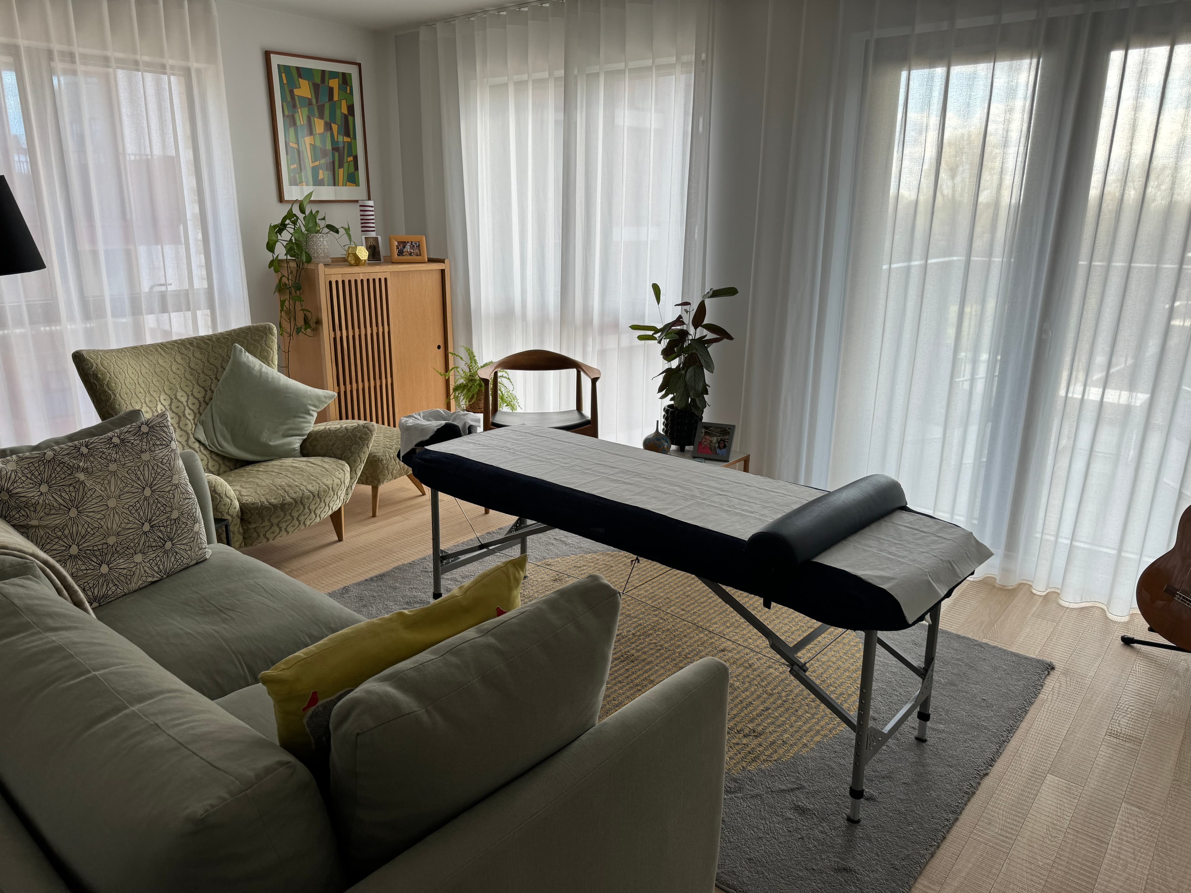 Professional massage table set up in a client's home
